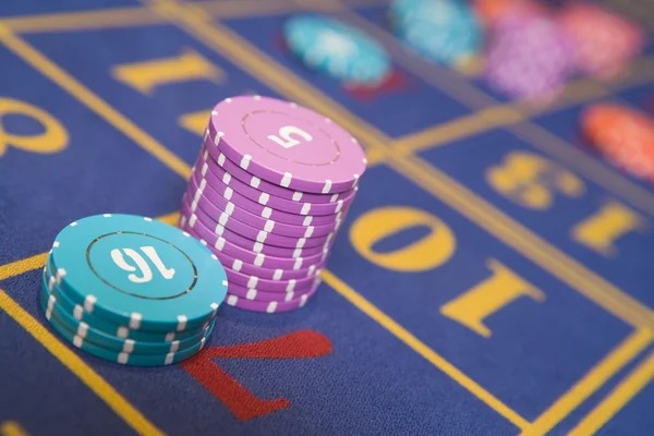 Live baccarat studio with professional croupier and card shoe